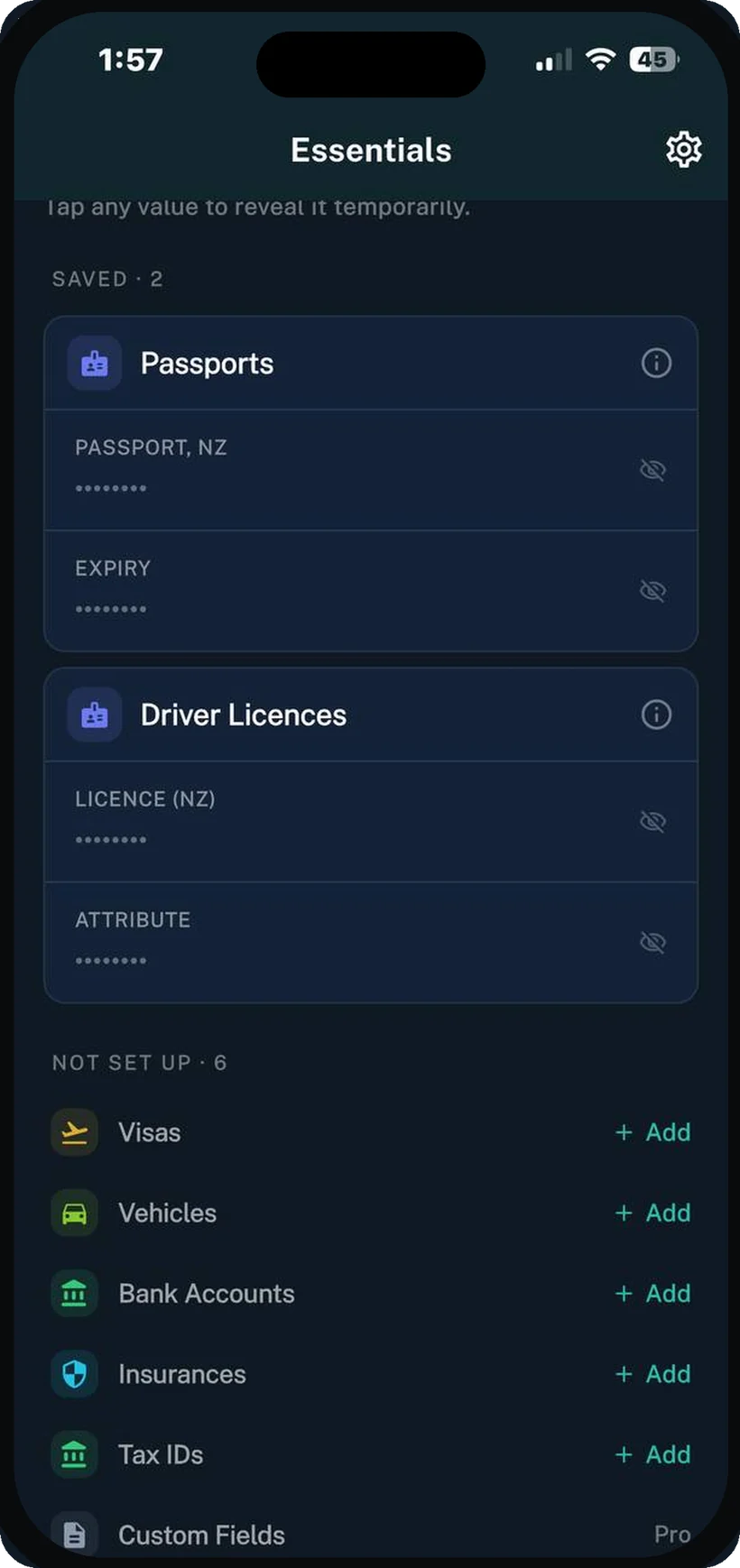 Essentials screen with masked passport, licence, and tax details ready to reveal